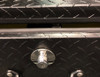 Safety plunger latches on our Westin BedSafe toolbox keep the drawers from fully closing to protect fingers and hands from accidental injury.  These plungers automatically open up when you unlock the lock and automatically lower when you lock the drawers. Shown on a box with our optional black textured powder coating.