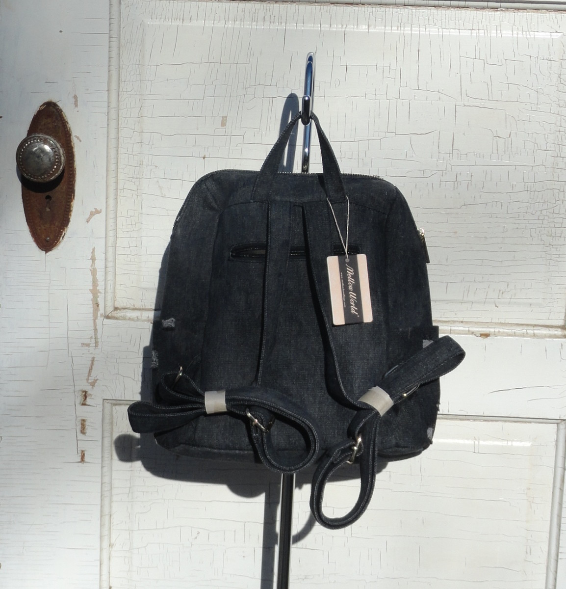 distressed denim backpack