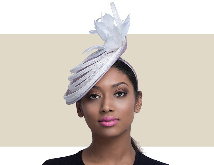 https://cdn10.bigcommerce.com/s-wskkt5d/products/1024/images/3963/nigel-rayment-sienna-nude-and-ivory-fascinator-hat__36589.1528760144.1280.1280.jpg?c=2