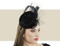 Jane Taylor London Leticia black and gold pillbox hat with feathers