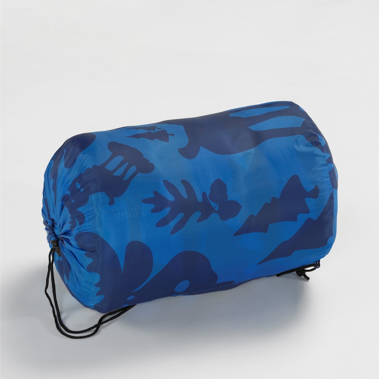Wenzel Kids Blue Moose 40 degree sleeping bag rolled and stored in the blue storage bag