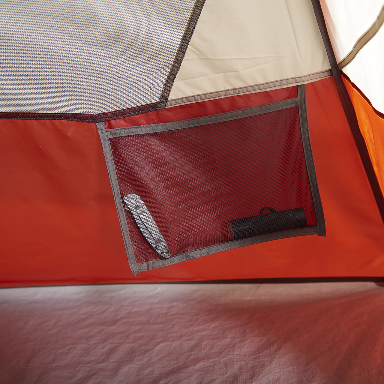 Interior close up of Wenzel Torry 2 Person Dome Tent, showing hanging mesh storage pocket