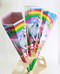 A white horse in front of a colorful rainbow and a lot of flowers are the leading images in this girlie Kidscone