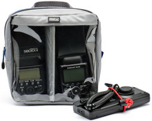 This large camera accessory bag perfectly fits two pro size flashes, large battery packs, and microphones