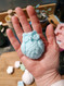 Owls - Medium Soap (OWL-MED), shown in hand for size comparison