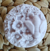 Sculpted Bee on bed of flowers round soap.