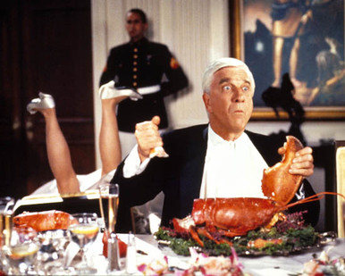 Leslie Nielsen in Naked Gun 2 1/2 : The Smell of Fear Poster and Photo