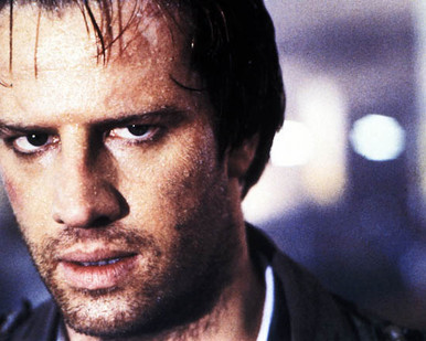 Christopher Lambert in Highlander (1986) Poster and Photo