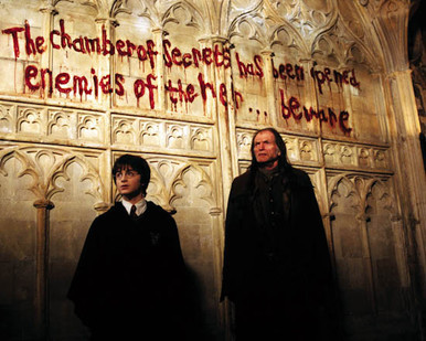 Daniel Radcliffe & David Bradley in Harry Potter and the Chamber of Secrets Poster and Photo