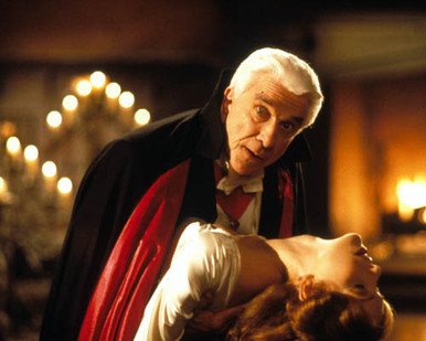 Leslie Nielsen & Amy Yasbeck Poster and Photo