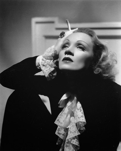 Marlene Dietrich striking pose holding a cigarette Premium Photograph and Poster 