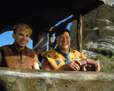 John Goodman & Rick Moranis in The Flintstones (1994) Poster and Photo