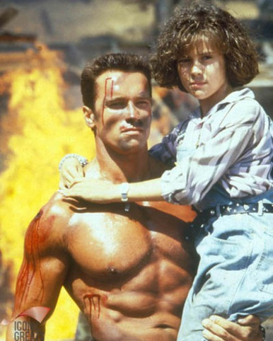 Arnold Schwarzenegger & Alyssa Milano in Commando Poster and Photo