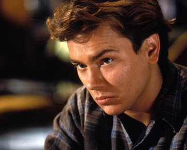 River Phoenix in Sneakers Poster and Photo