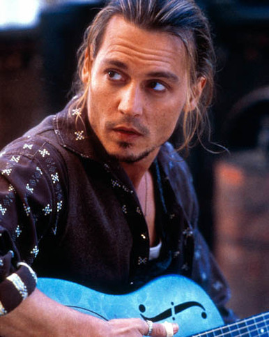 Johnny Depp in Chocolat (2001) Poster and Photo