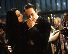 Anjelica Huston & Raul Julia in The Addams Family (1991) Poster and Photo