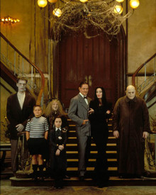 Raul Julia & Anjelica Huston in Addams Family Values Poster and Photo