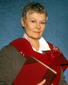 Judi Dench in Tomorrow Never Dies Poster and Photo