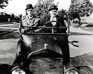 Stan Laurel & Oliver Hardy in Big Business (Laurel & Hardy) Poster and Photo