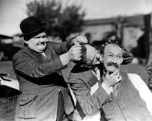 Stan Laurel & Oliver Hardy in Big Business (Laurel & Hardy) Poster and Photo