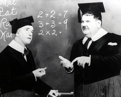 Stan Laurel & Oliver Hardy in A Chump At Oxford (Laurel & Hardy) Poster and Photo