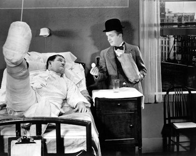Stan Laurel & Oliver Hardy in County Hospital (Laurel & Hardy) Poster and Photo