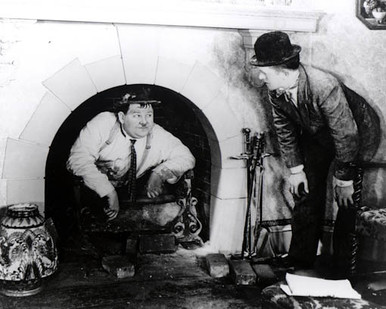 Stan Laurel & Oliver Hardy in Dirty Work (Laurel & Hardy) Poster and Photo