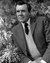 Dirk Bogarde in May We Borrow Your Husband Poster and Photo