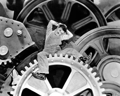 Charles Chaplin in Modern Times a.k.a. les temps modernes Poster and Photo
