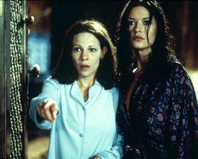 Lili Taylor & Catherine Zeta Jones in The Haunting Poster and Photo