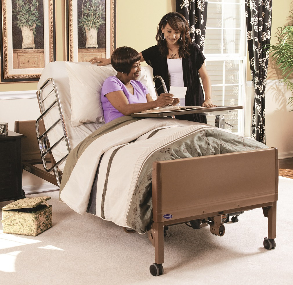 invacare 5410ivc full electric hospital bed with bed rails over bed light nursing home