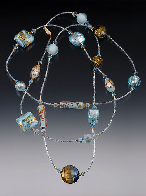 A Venetian sky filled with soft clouds is yours to wrap around your neck as often as you like with this spectacular rope featuring 24K flecked celestial blue Venetian glass, 24K  Swarovski crystals, and 14K clasp. No two alike! All components custom-designed and imported from Italy! Choose 44" or 64