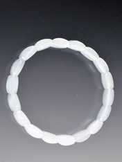 A delicate pale chalcedony bracelet circles your wrist makiing a subtle statement - or stack with others.  7"