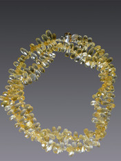 Perfect for this season's mix and match mood this delicate rope features tiny pale lemon citrine briolettes.  Wear it long and layered or doubled or tripled.  28"