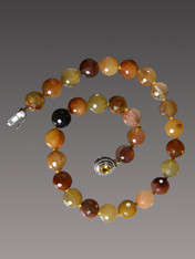 For the collector of rare and beautiful stones, this multi-tones deeply patterned rutilated quartz necklace is a gem! 18"

