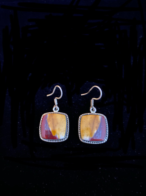 These colorful dangle earrings feature large Australian moukaite cabochons wrapped in sterling silver.  They complement all the fall tones in your wardrobe. 1-1/4"   Choose oval or square. Only one of each!