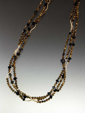 All out Deco Drama! A glittering 64" strand of 14K curved beads, 