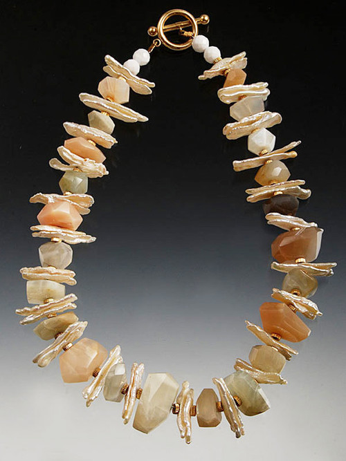 Fabulous rainbow moonstone nuggets with delicate shades of peach, white, gray and other pastels, white stickpearls, and 14K  rondels. 