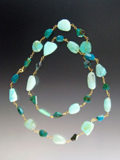This rope features chrysocolla, peruvian opal, and hemimorphite for an elegant effect.
