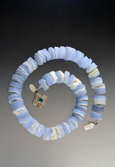 This raw blue calcedony spiral collar goes with everything all year round.