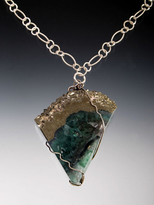 Stunning fluorite slice radiates deep green and purple with a natural band of rich pyrite (known as fool's gold). 20"  