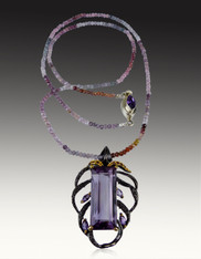 Huge Natural Faceted Amethyst With Black Gold Overlay Frame and Grade AAA Violet Spinel Chain