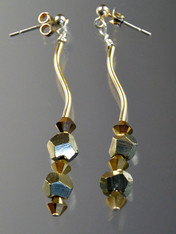 These glittering earrings feature alternating silver pyrite and 24K Swarovski crystals!
