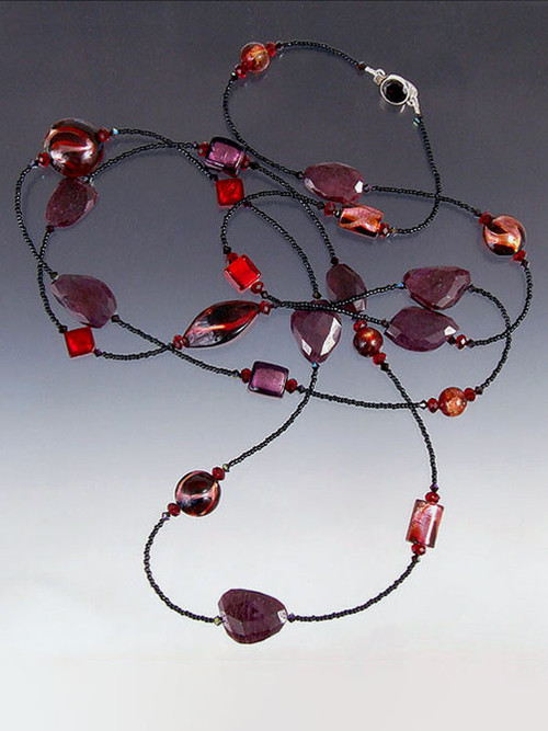 This vibrant rope of raw ruby slices, 24K ruby/garnet Venetian glass  lets you double or triple with ease. Choose 42" or 64". 