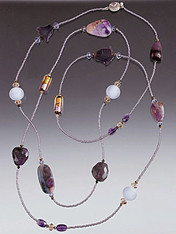 The beautiful rope features South African sugilite slices.  Choose 44" or 44"