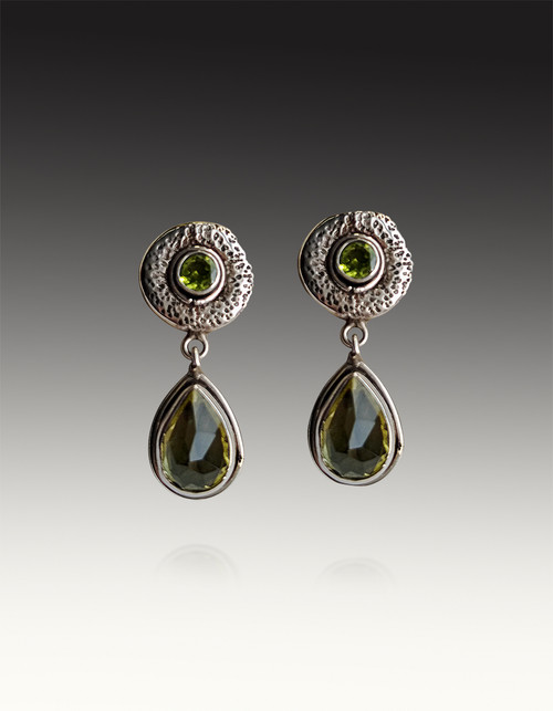 These one of a kind Echo of the Dreamer dangle earrings feature grade AAA peridot cabochons and blue quartz dangles set in an elaborate sterling silver frame.  Posts only.  1.4" x 3.4"

 