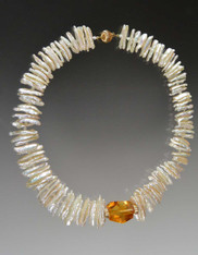 White Biwa Stick pearls with Swarovski crystals, genuine 14K rondels and Brazilian Grade AAA faceted Citrine centerpiece. 18"