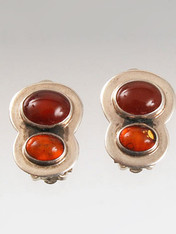 Amy Kahn Russell original design double discs of carnelian and Baltic Amber bezel set in sterling silver. 3/4" x 1/2" Clips; can be converted to posts for an additional $12.