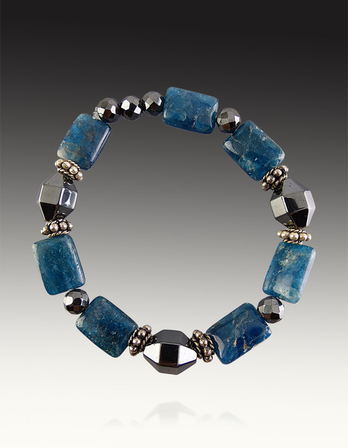 This new design by guest designer Yumiko Togashi features kyanite, marcasite, and pyrite in an elegant 8" stretch bracelet.