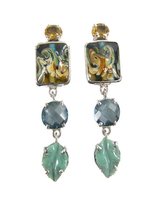 These dazzling Amy Kahn Russell dangle earrings feature handmade beautifully patterned glass, faceted blue quartz, citrine, and carved leaf stones, all prong and bezel set in shimmering sterling silver. Now clips; can be converted to posts by Amy for $24.  
Dimensions: 2.00'' (L) x 0.50'' (W)


 